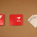 Custom poker-size playing cards — full-deck print on coloured-core paper or waterproof PVC