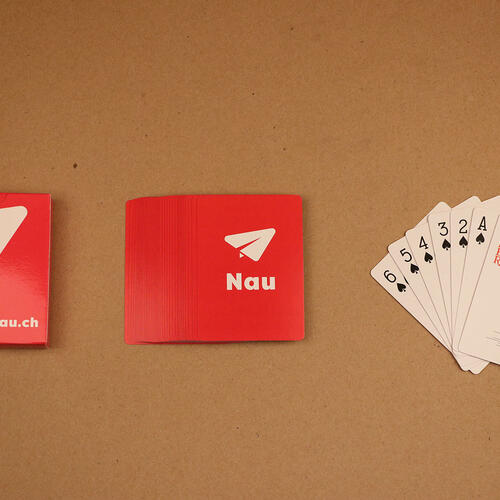 Custom poker-size playing cards — full-deck print on coloured-core paper or waterproof PVC
